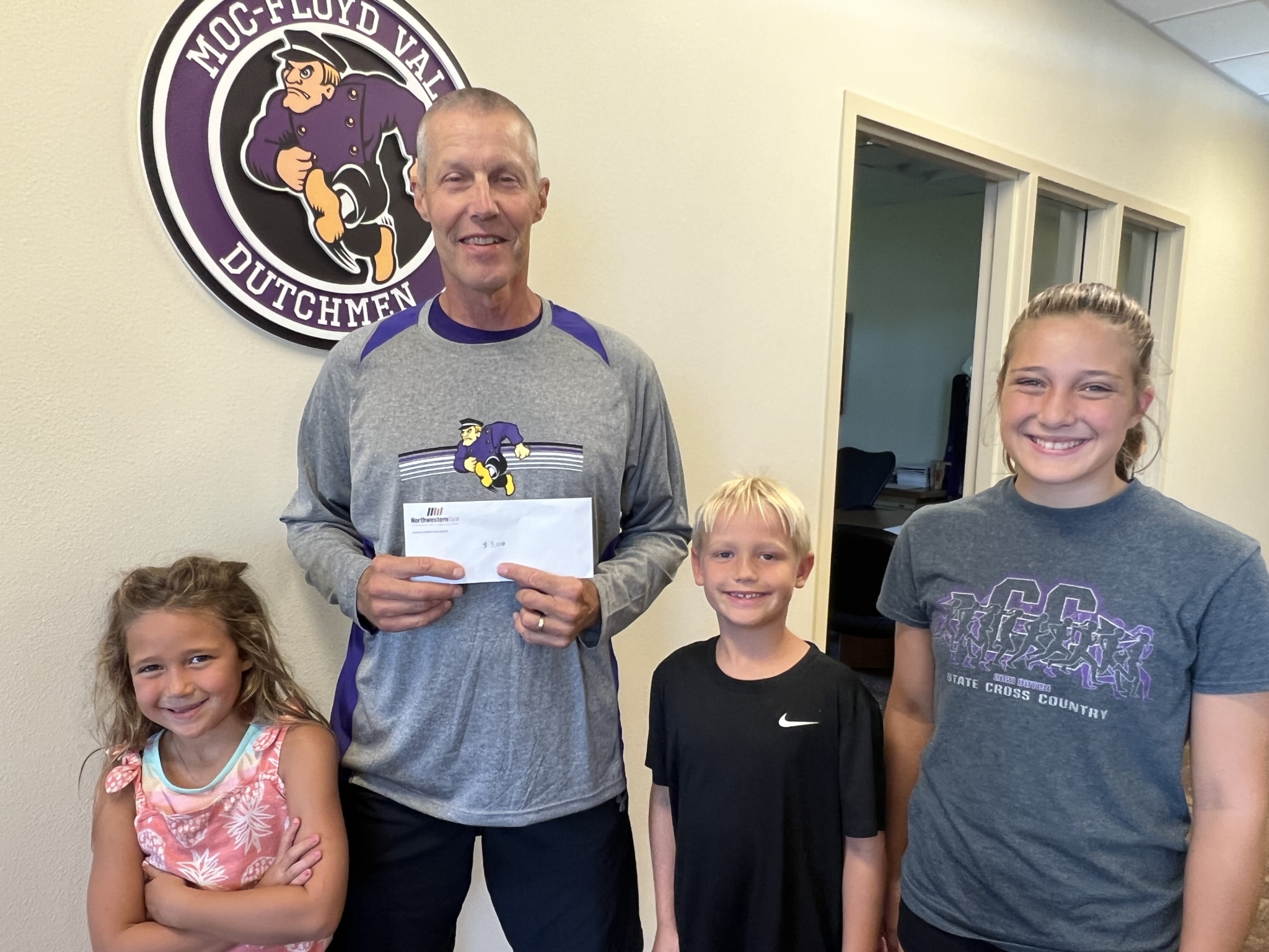 Students Raise Funds for New Elementary School Fields Vibrant Orange